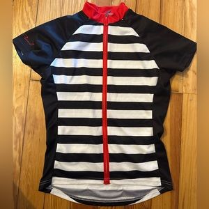 Primal bike jersey women’s M. Black + white stripes, red zip + accents. Like new